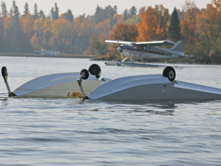 Float plane upside down in the water